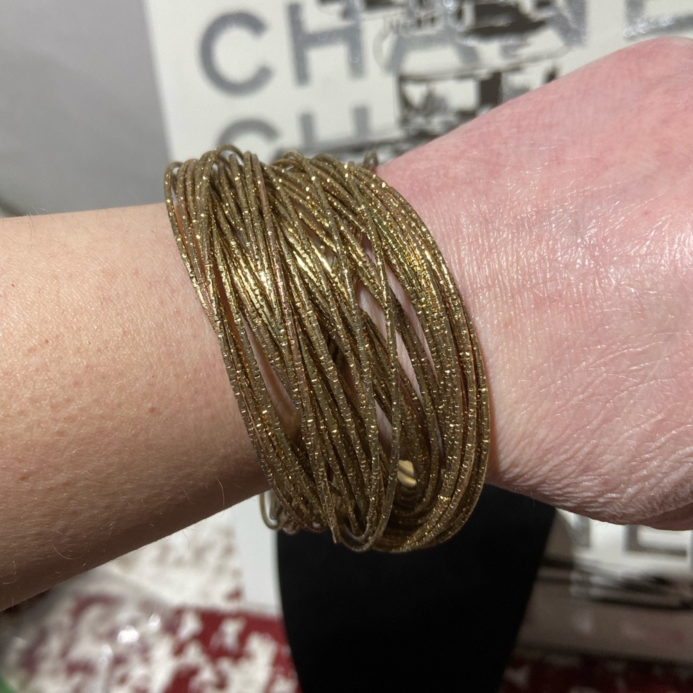 Gold Tone Intertwined Bangles Specially Cut to Sparkle in Light